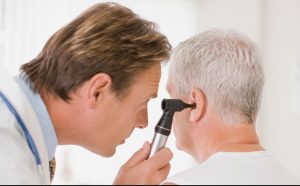 doctor examining inner ear